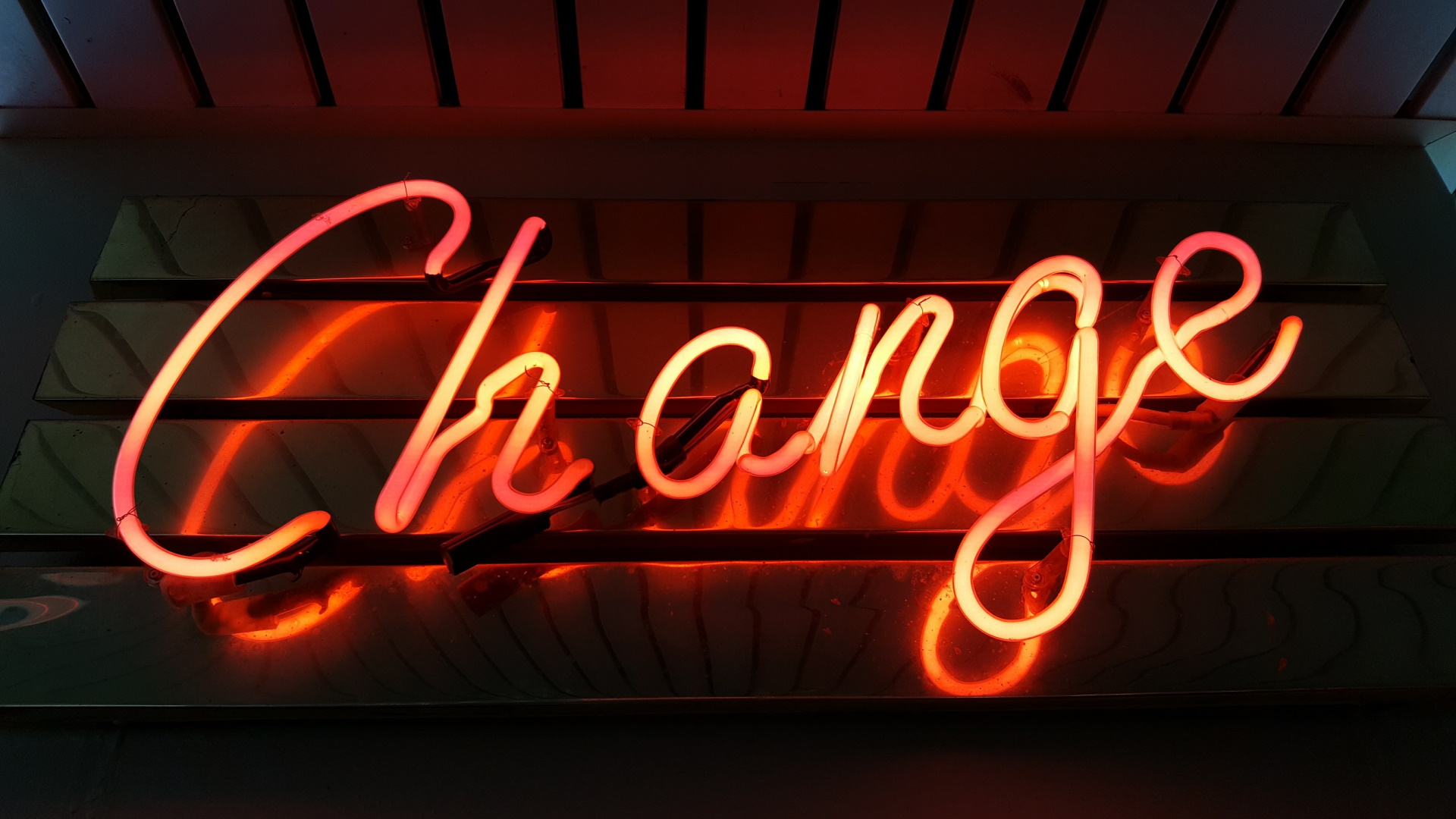 how to sell a business amid the coronavirus pandemic - change neon sign